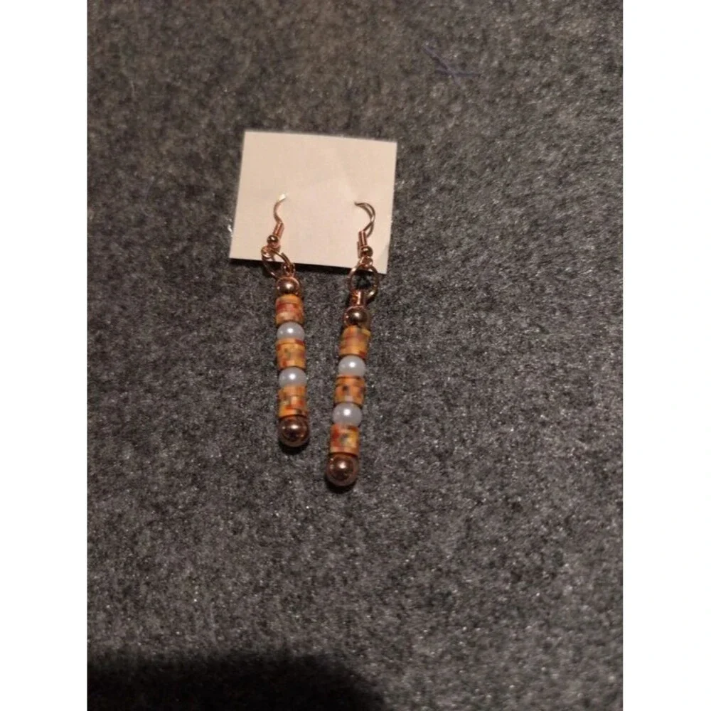 Orange and pearl beaded dangle earrings